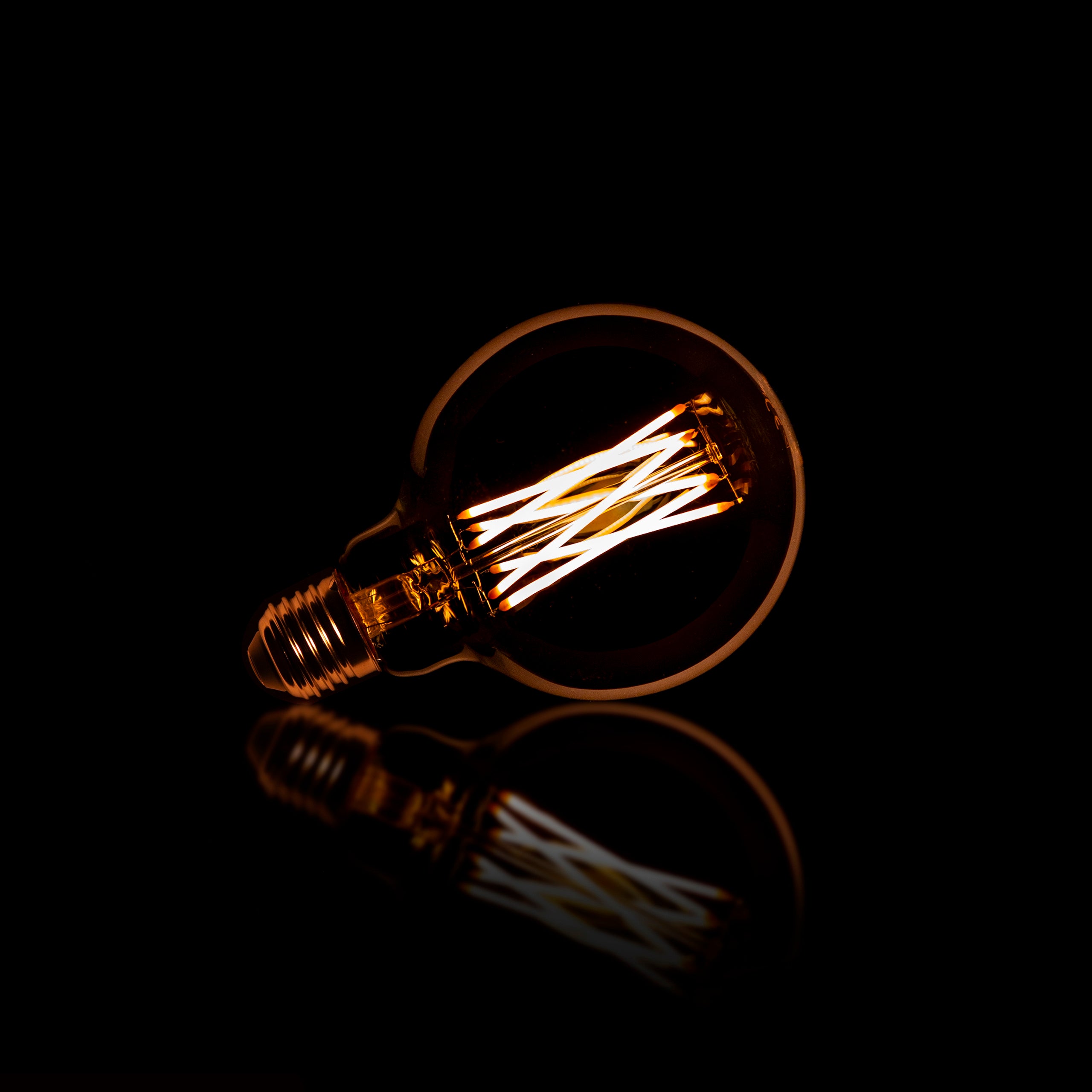 Lichtbron LED Filament G95 | Ø9,5cm | Amber glas